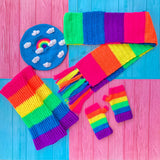 A neon rainbow set of crochet accessories including a beret, chunky scarf, leg warmers and fingerless gloves by VelvetVolcano