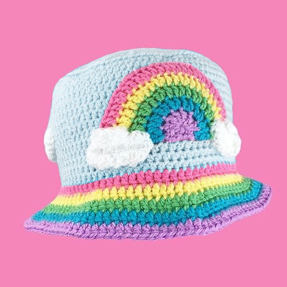 Kawaii Duck Egg Blue crochet bucket hat with pastel rainbow and cloud motif and a pastel rainbow striped brim by VelvetVolcano