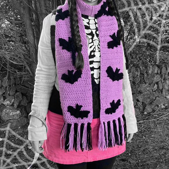 Lilac crocheted chunky scarf with black bat repeating applique pattern and lilac and black tassels by VelvetVolcano