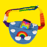 Dolphin Blue Crochet Bum Bag / Fanny Pack / Waist Bag / Crossbody Bag with Bright Rainbow Striped Strap, and a Bright Rainbow and Cloud Design by VelvetVolcano