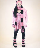 Image of Kaya aka Toxic Tears wearing a Black and Bubblegum Pink Outfit including VelvetVolcano Chunky Crochet Striped Scarf, Chunky Boot Cover Leg Warmers, Striped Fingerless Gloves and Slouchy Polka Dot Pom Pom Beanie