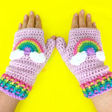 Baby Pink crochet fingerless gloves with pastel rainbow and cloud motif and pastel rainbow striped cuffs. Pastel Rainbow Cloud Fingerless Gloves (Baby Pink) by VelvetVolcano