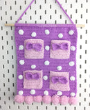 Lilac Polka Dot Crochet Wall Hanging with Baby Pink Bow Pockets and Pastel Pink Pom Pom Trim - Girly Kawaii Organiser Home Decor by VelvetVolcano