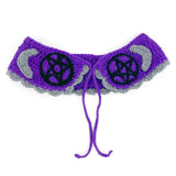 VelvetVolcano Witchy Collar, a violet Peter Pan style crochet detachable collar with black pentagrams, grey moons and black stars and a grey scallop trim around the bottom edge.