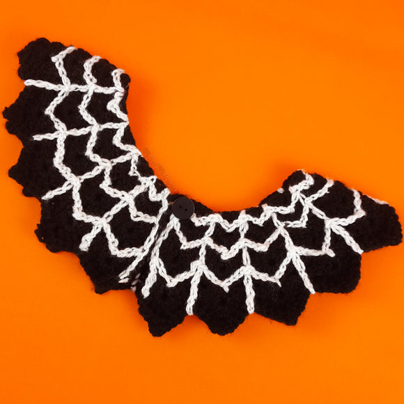 Black crocheted detachable collar with a hand stitched white spider web design by VelvetVolcano 