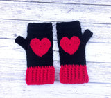 Black crochet hand warmers with red heart design and red cuffs. Heart Fingerless Gloves by VelvetVolcano