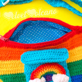 Bright rainbow striped crochet fanny pack with turquoise pocket and rainbow cloud detail. Bright Rainbow Stripe Cloud Pocket Bum Bag by VelvetVolcano