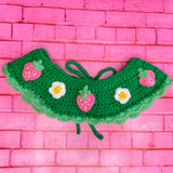 Emerald green crochet Peter Pan style collar with pastel green scallop trim on the bottom edge, cute frog appliques on the lapels of the collar and a repeating pattern of daisies and pastel strawberries on the rest of the collar. Froggy Collar by VelvetVolcano