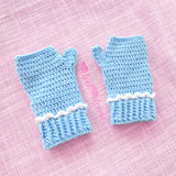 Pastel Blue crochet gloves with white cloud pattern and white frill at the top of the cuffs by VelvetVolcano