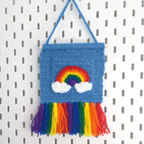 Dolphin Blue Crochet Wall Hanging with Pocket, Rainbow Cloud Motif and Rainbow Tassels by VelvetVolcano