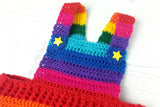 Brightly Coloured Rainbow Striped Crochet Baby Dungarees with Yellow Star Button Fastenings made from Acrylic Yarn in Red, Orange, Yellow, Green, Turquoise, Royal Blue, Purple and Pink.