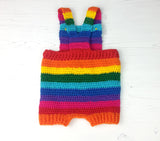 Brightly Coloured Rainbow Striped Crochet Baby Dungarees with Yellow Star Button Fastenings made from Acrylic Yarn in Red, Orange, Yellow, Green, Turquoise, Royal Blue, Purple and Pink.