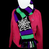 Purple, neon green, black and white striped crochet scarf with white cobweb panels and multicoloured tassels. Spider Web Stripe Scarf (Custom Colour) by VelvetVolcano