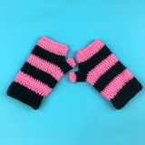 VelvetVolcano Bubblegum Pink & Black Striped Fingerless Gloves crocheted from acrylic yarn