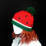 Red, White and Emerald Green fruit / melon themed bobble hat with black rhinestone seeds. Watermelon Pom Pom Beanie (Custom Colour) by VelvetVolcano